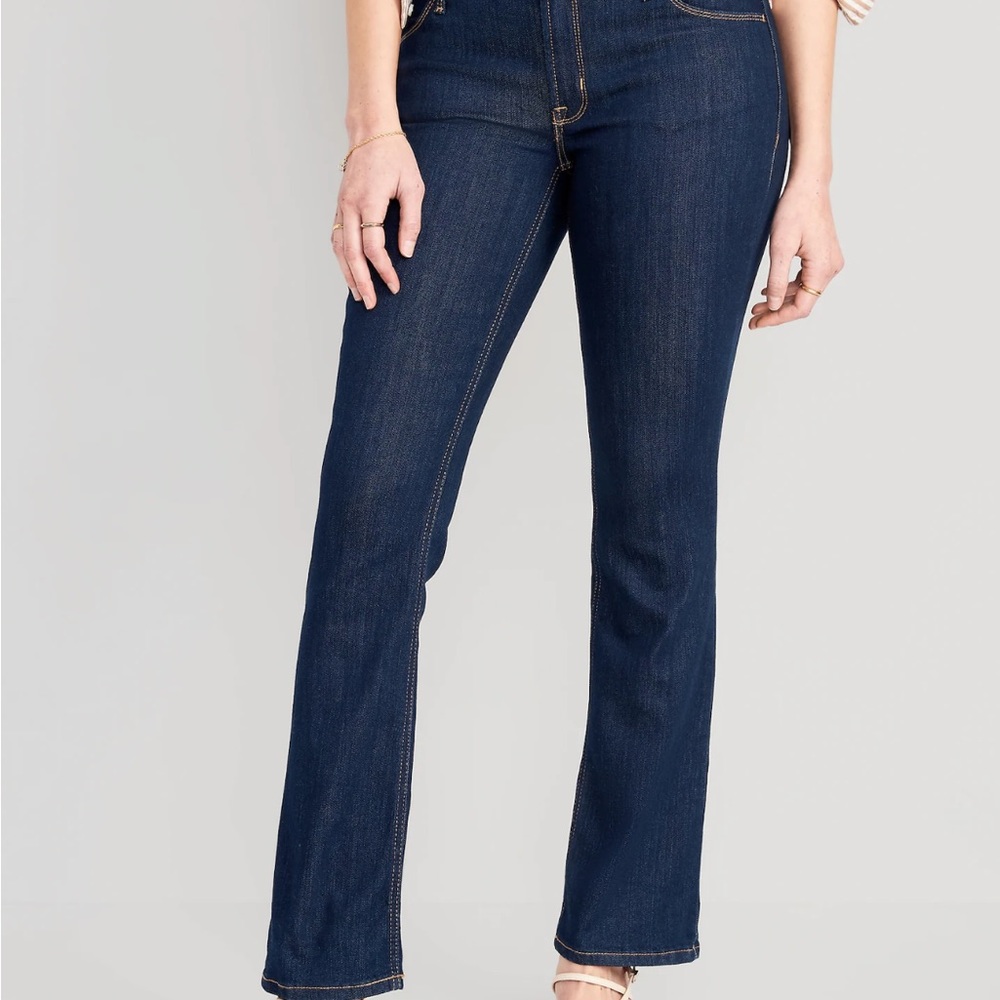 Mid rise boot cut jeans.